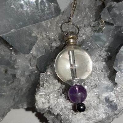 Pendule en cristal de roche et amethyste